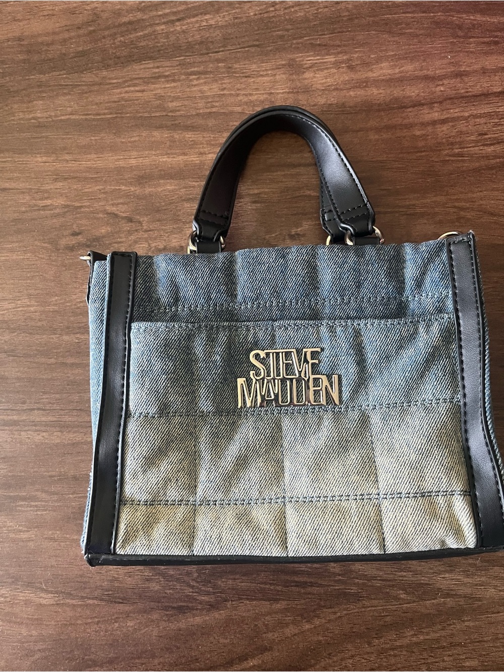 Steve Madden Denim Messenger Bag with Black Trim and Gold Accent